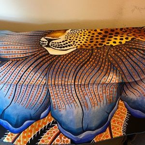 Hermes scarf with leopard on it